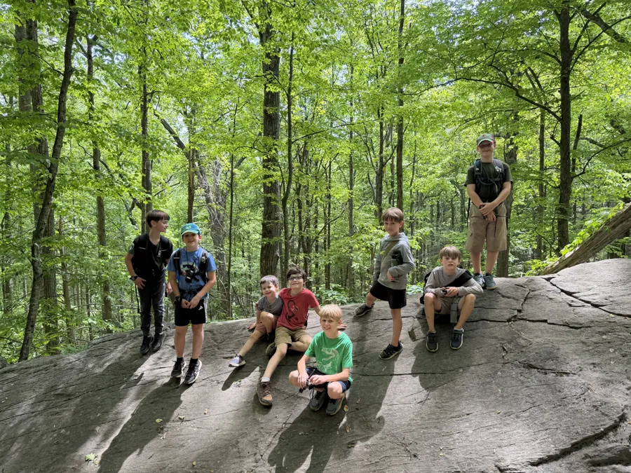 Trailmen pausing together during a hike at Vogel State Park